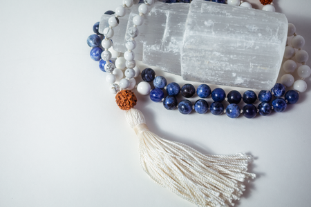 Blue Sodalite and white Howlite crystal beaded necklace with Rudraksha seed and white silk tassel.